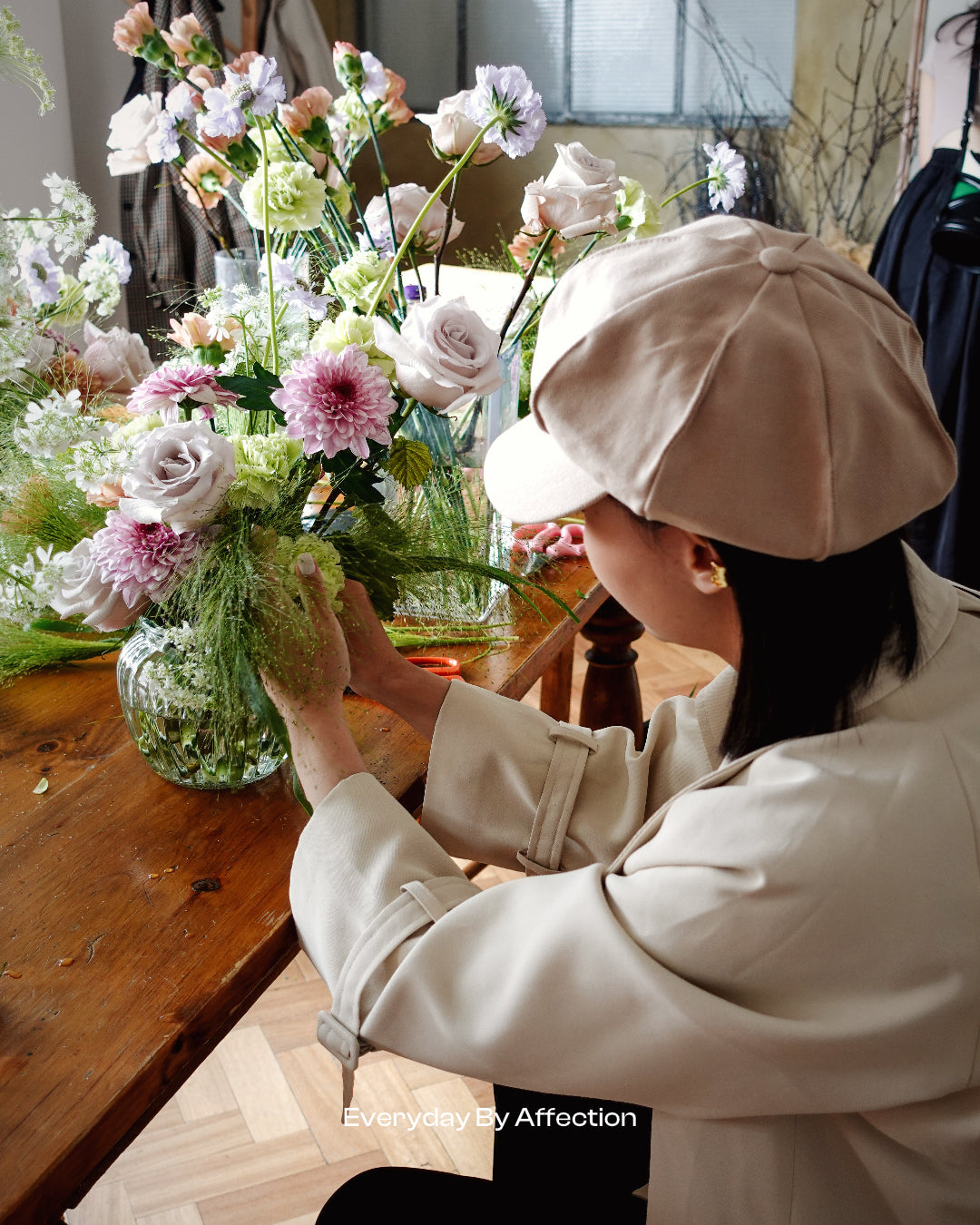 arranging flowers in vase