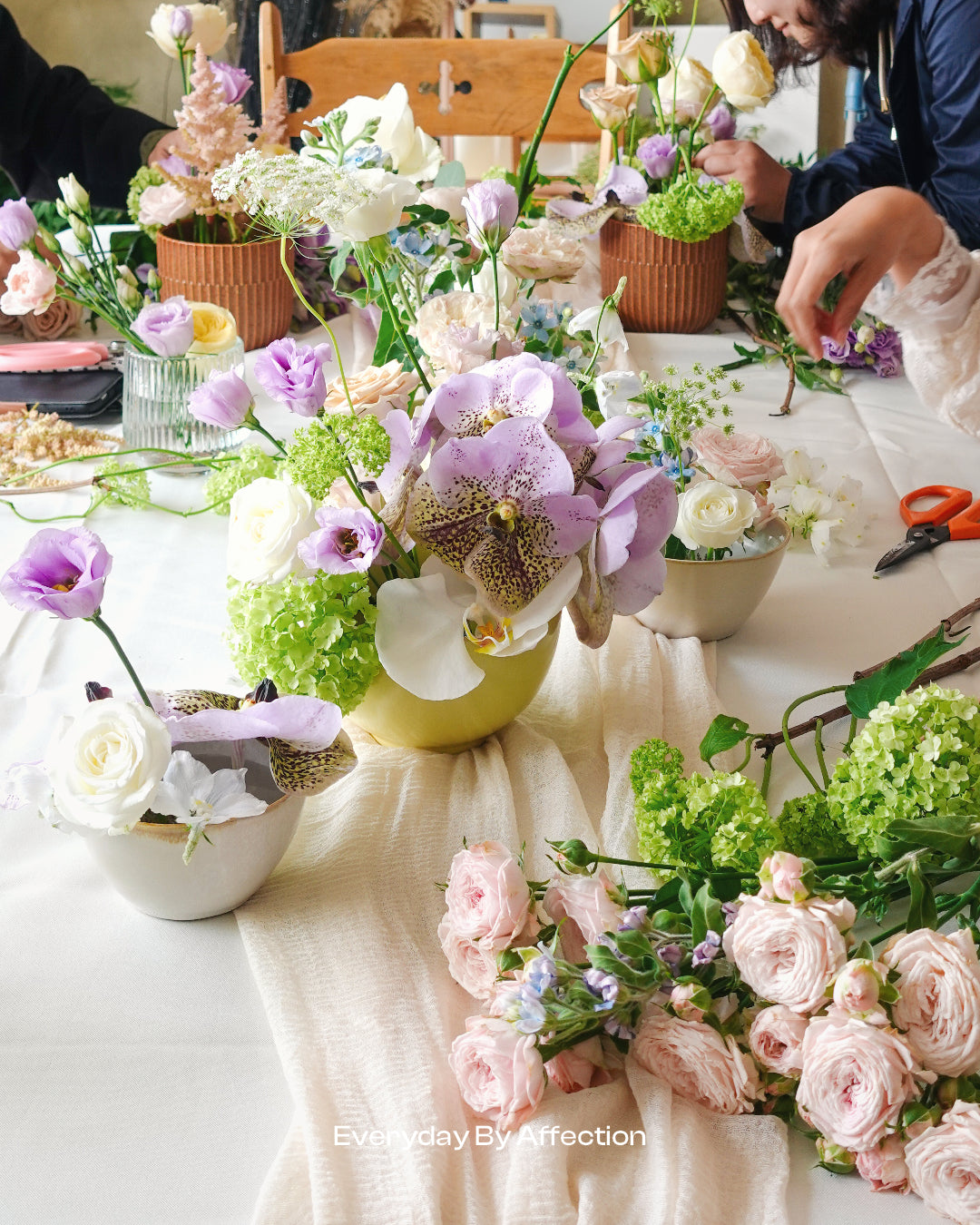 flowers in vases on a table